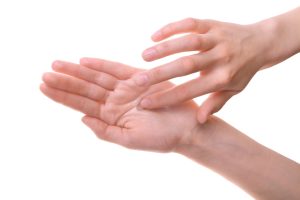 Washing contact lens in hands